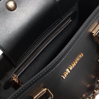 THE DANGLING HANDBAG